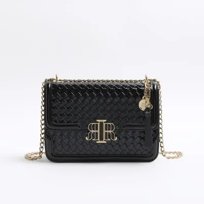 Black embossed woven satchel bag sold by River Island