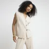 Beige plisse waistcoat sold by River Island