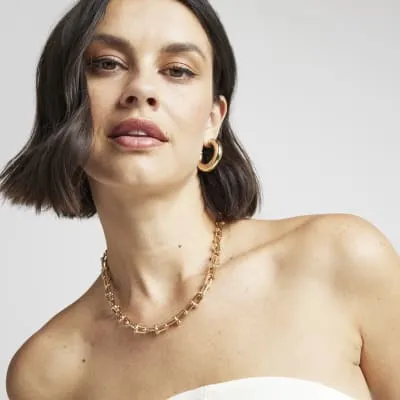 Gold chain link necklace sold by River Island