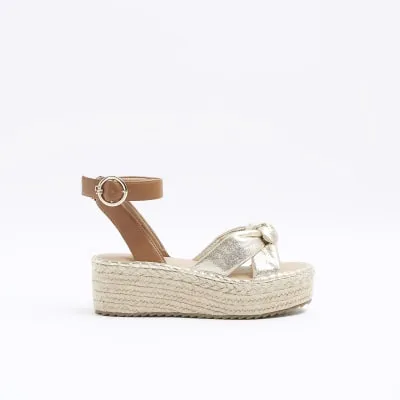Gold flatform espadrille sandals sold by River Island