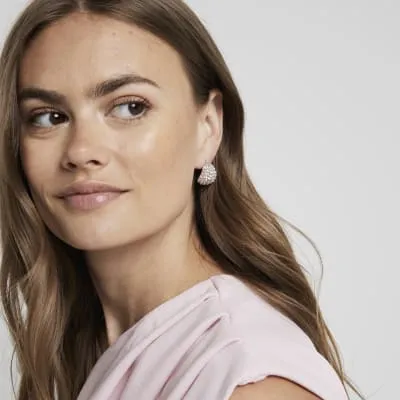 Rose gold diamante domed earrings sold by River Island