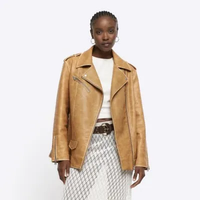 Brown oversized faux leather biker jacket sold by River Island