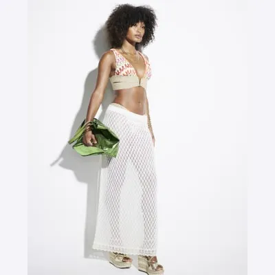 White crochet elastic bikini top sold by River Island