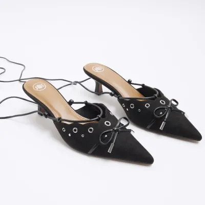 Black eyelets lace up heeled court shoes sold by River Island