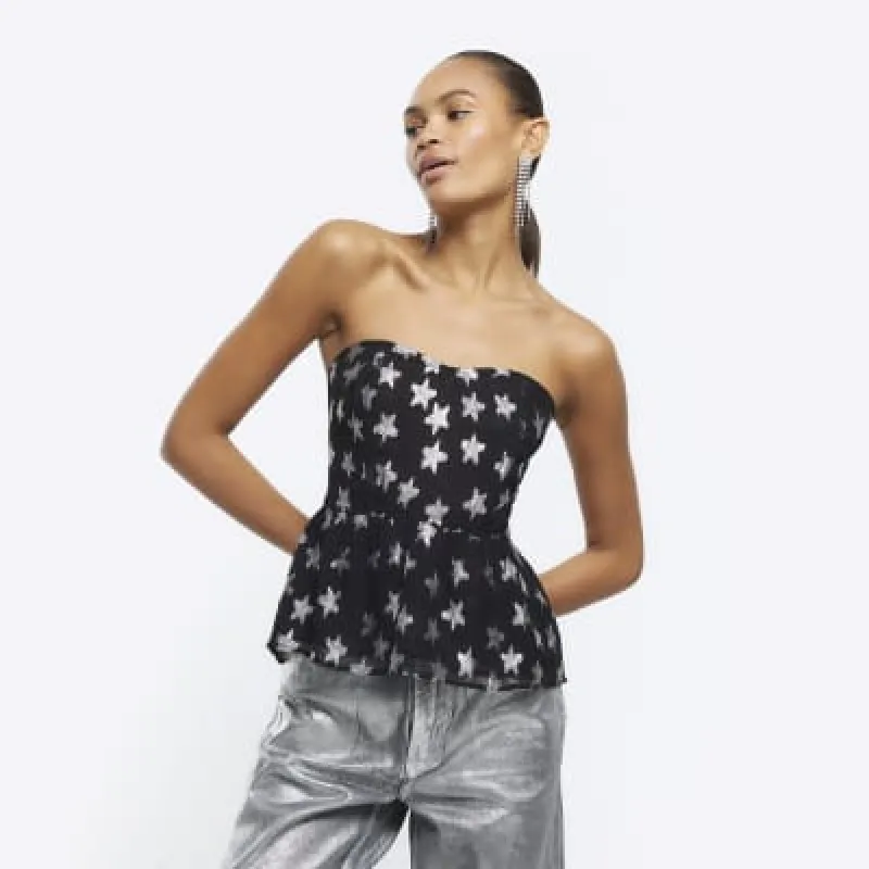 Black metallic star bandeau top sold by River Island