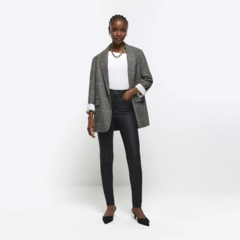 Black skinny bum sculpt coated jeans sold by River Island