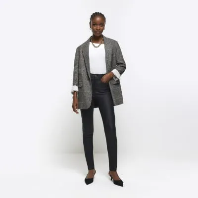 Black skinny bum sculpt coated jeans sold by River Island