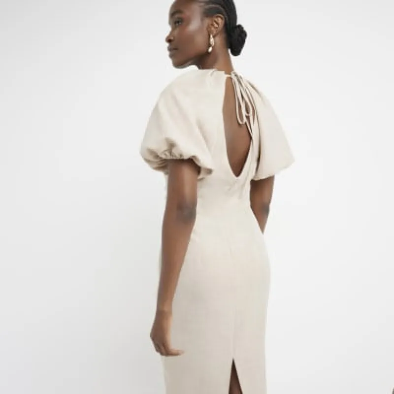 Beige ruched puff sleeve shift midi dress sold by River Island