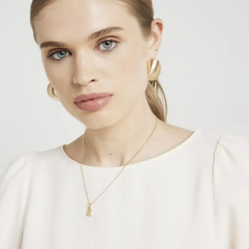 Gold Plated R Initial Necklace sold by River Island