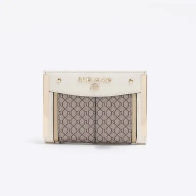 Cream monogram panel purse sold by River Island
