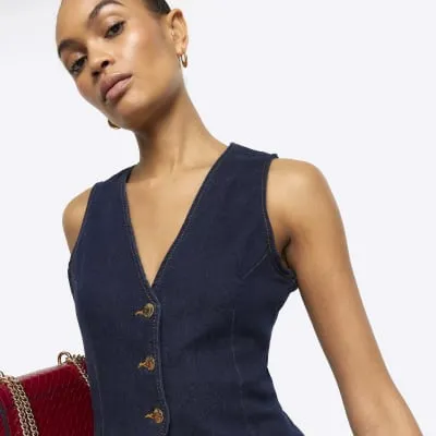 Blue button up denim waistcoat sold by River Island