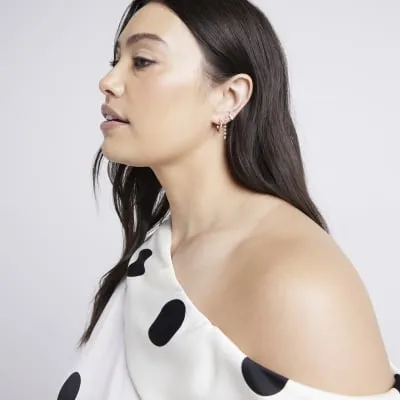 Gold colour diamantine earrings multipack sold by River Island