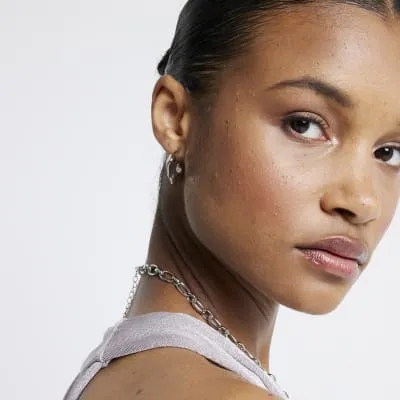 Silver chunky hoop earrings sold by River Island