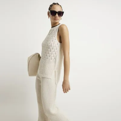 White crochet stitch detail knit top sold by River Island