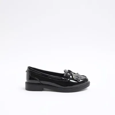 Black bow fringe loafers sold by River Island