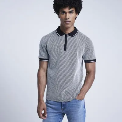 Black slim fit jacquard half zip polo sold by River Island