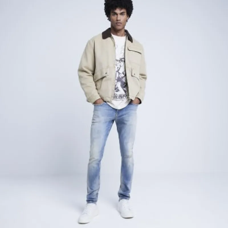Blue skinny fit ripped jeans made by River Island