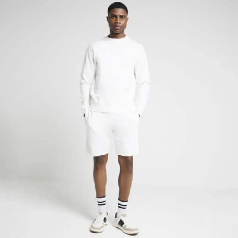 Beige slim fit plain sweatshirt sold by River Island