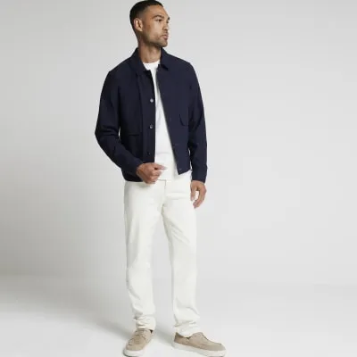 Navy slim fit cotton overshirt sold by River Island