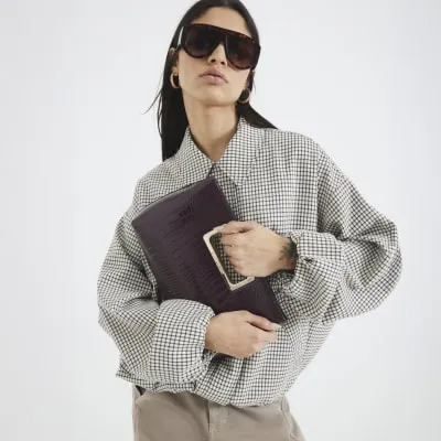 Red Metal Handle Clutch Bag sold by River Island