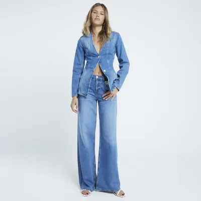 Blue mid rise wide leg jeans sold by River Island