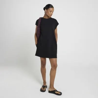 Black sleeveless sweatshirt mini dress sold by River Island