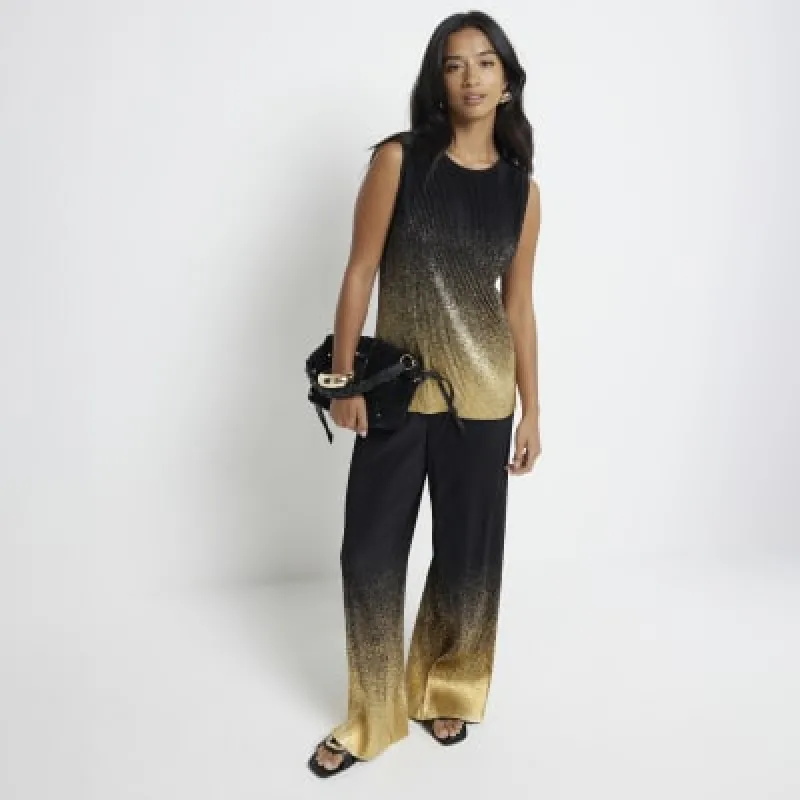 Petite black plisse ombre wide leg trousers sold by River Island