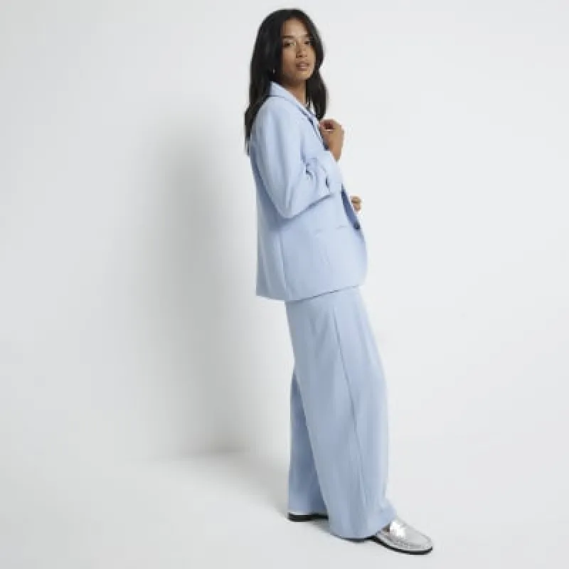 Petite blue wide leg trousers sold by River Island