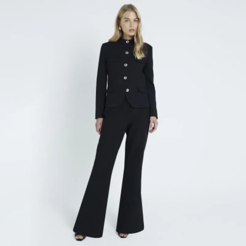 Black side split soft flared trousers sold by River Island