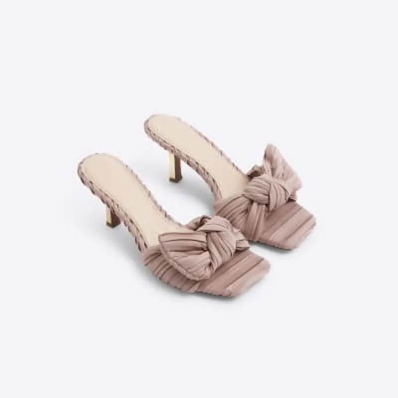 Pink ruched bow mule heeled sandals sold by River Island