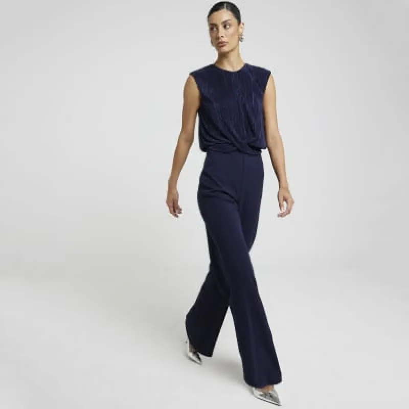 Navy plisse top wide leg jumpsuit sold by River Island