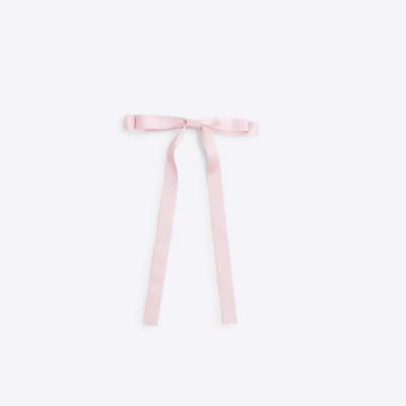 Pink skinny bow hair clip sold by River Island