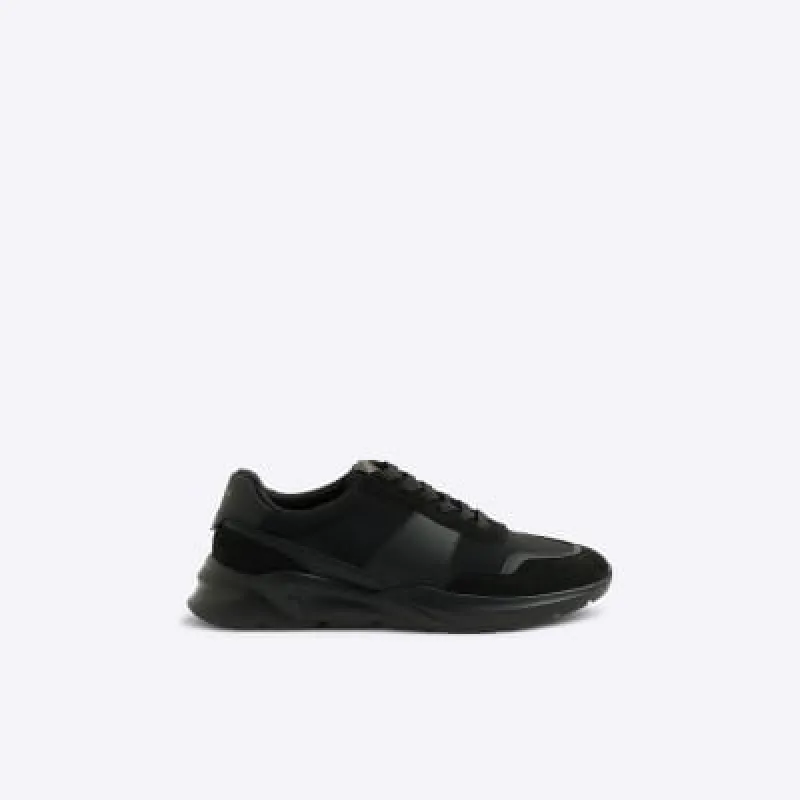 Black runner trainers sold by River Island