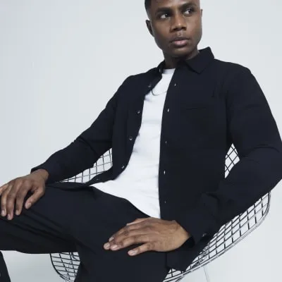 Black slim fit waffle textured shirt sold by River Island