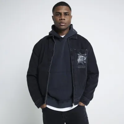 Black graphic print denim jacket sold by River Island