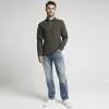 Khaki slim textured half zip long sleeve polo sold by River Island