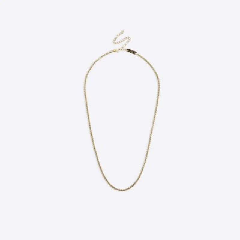 Gold colour cable chain necklace sold by River Island