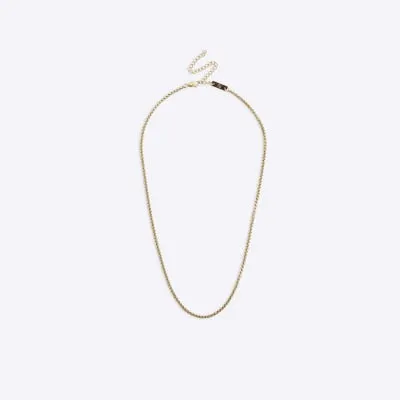 Gold colour cable chain necklace sold by River Island