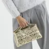 Gold Faux Leather Quilted Clutch Bag sold by River Island