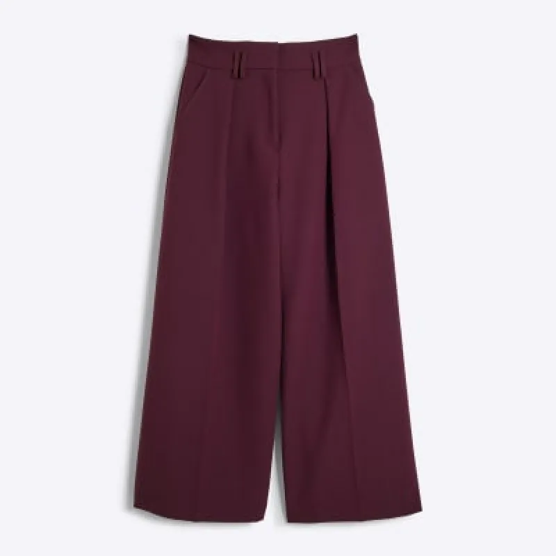 Petite red high waisted wide leg trousers sold by River Island