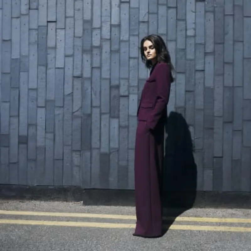 Red premium high waisted wide leg trousers sold by River Island