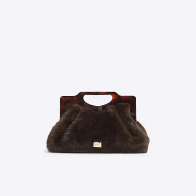 Brown faux fur Frame handle clutch bag sold by River Island