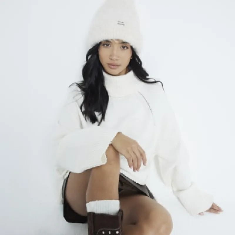 Petite Cream Cow Faux Shawl Fur Coat sold by River Island