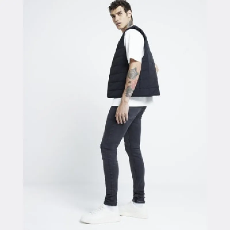 Black spray on skinny fit jeans made by River Island