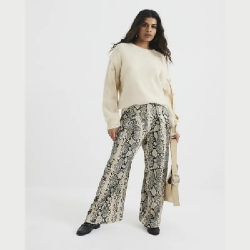 Petite Cream Snake Print Wide Leg Trouser sold by River Island