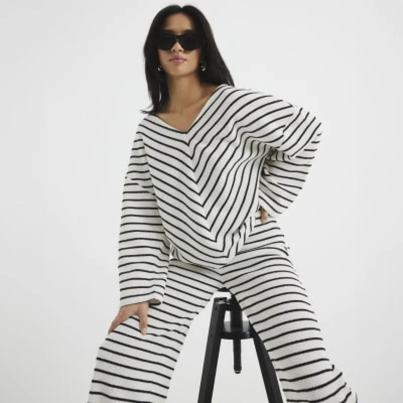 Petite Cream Long Sleeve Stripe V Neck Top sold by River Island