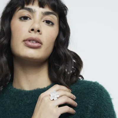 Silver Crystal Flower Ring sold by River Island