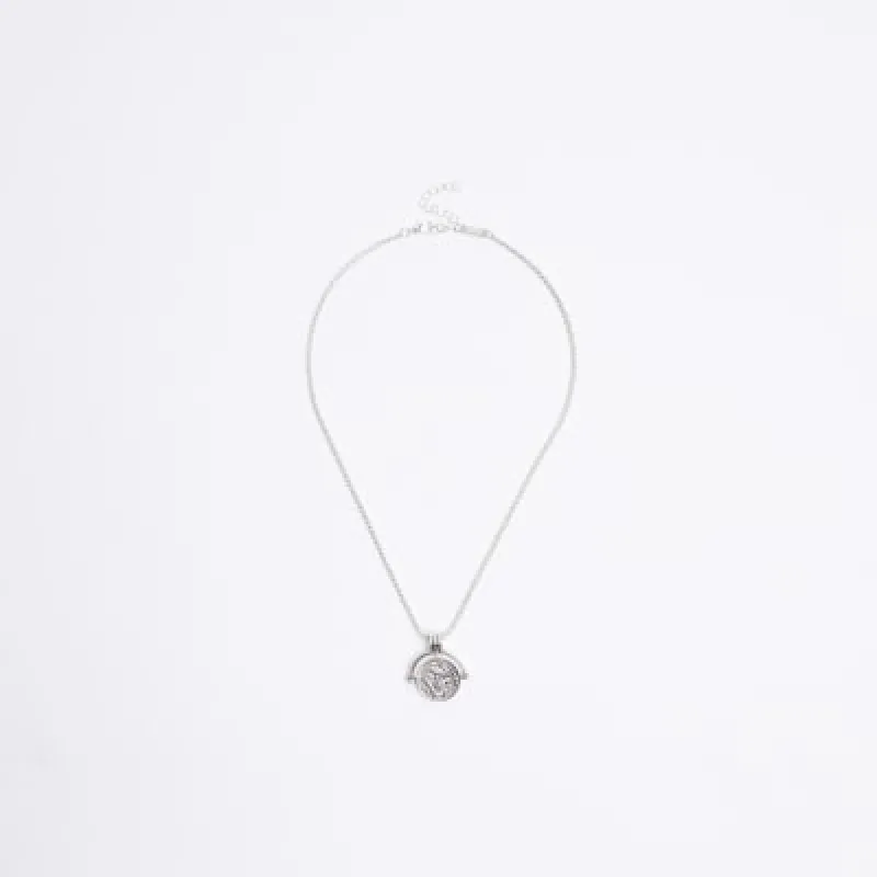 Silver Dragon Spinner Necklace sold by River Island