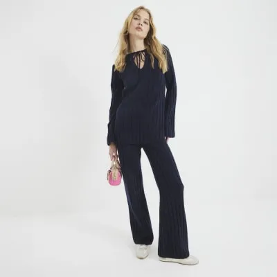 Navy Ribbed Flared Trousers sold by River Island