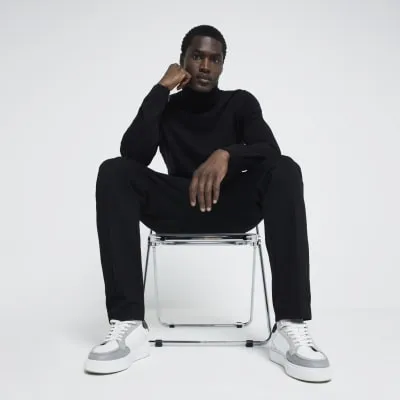 Black Slim Fit Roll Neck Jumper sold by River Island